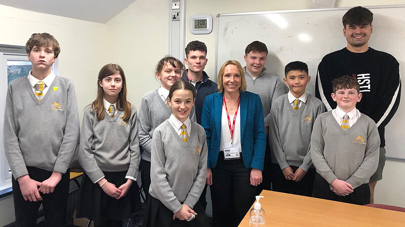 Helen with students at Sir John Talbot's school