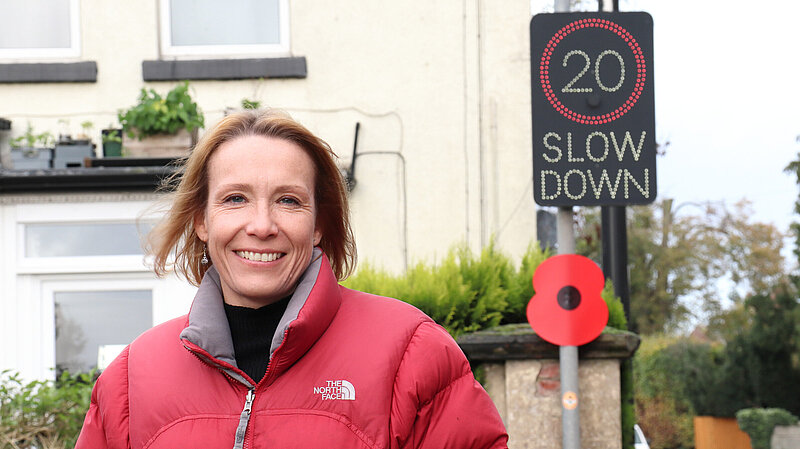 Helen with a 20mph sign