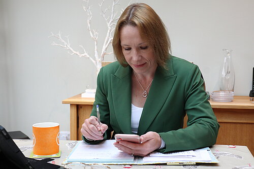 Helen at her desk