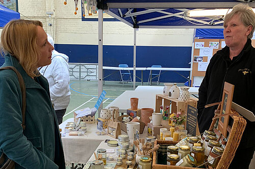 Helen with stallholder at Ellesmere Market