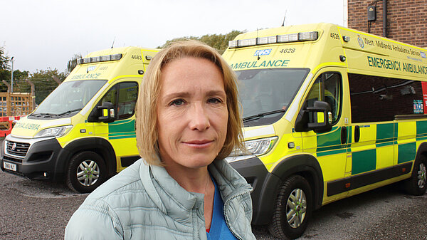 Helen Morgan with local ambulances