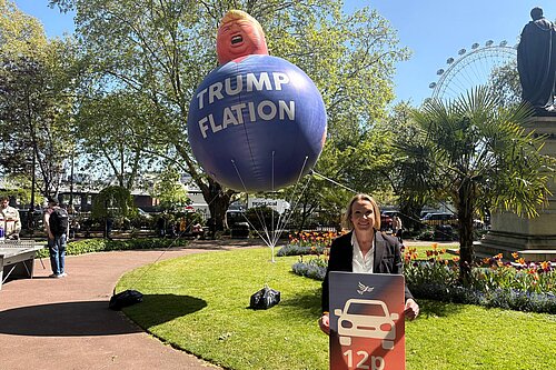 Helen Morgan MP with Trumpflation balloon