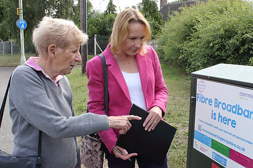 Helen talks to local resident about digital switchover