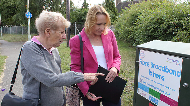 Helen talks to local resident about digital switchover