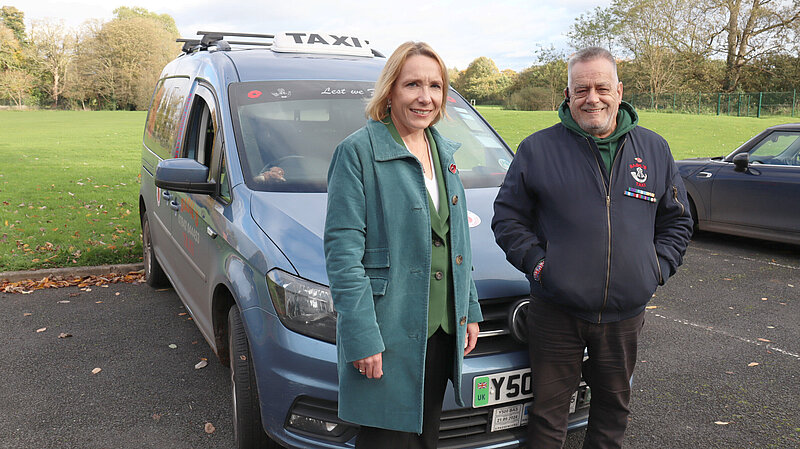 Helen with 'Basil' and his taxi