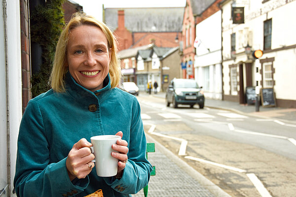 Helen enjoying a cup of coffee