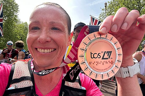Helen Morgan MP with London Marathon medal